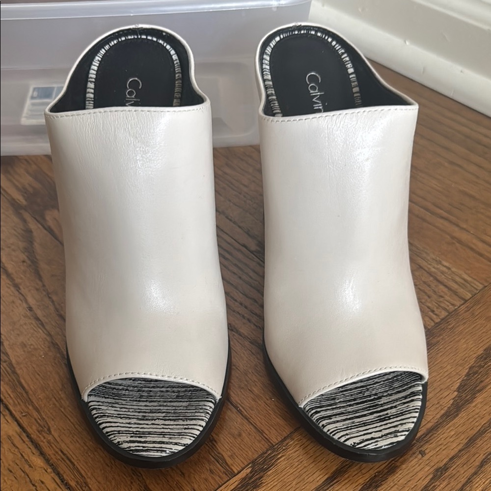 Calvin Klein White and Black Mules Sleek Design